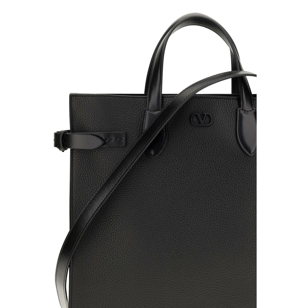 Medium Crossbody Travel Satchel Shoulder Bag by Valentino Garavani for men in bos taurus calf leather black & palladium features an effortlessly chic silhouette with a secure , ample , and versatile crossbody-strap, shoulder-strap, handle & adjustable-strap for effortlessly chic everyday luxury.