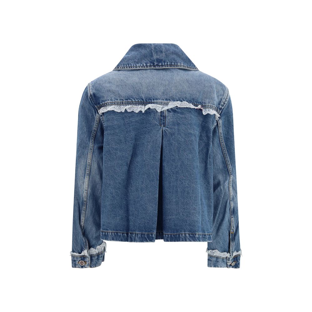 Trucker Jacket by Ganni for women in denim cotton blue features an contemporary silhouette, showcasing a sophisticated and contemporary pockets for a truly refined look.