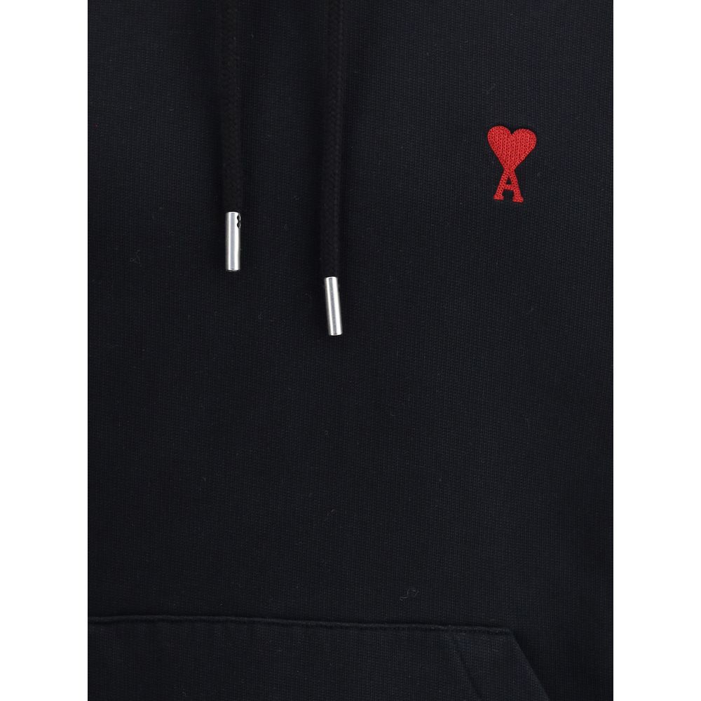 Sweatshirt Hoodie by Ami Paris for men in cotton black features a slouchy chic silhouette, detailed with a slouchy chic and a signature for an elevated aesthetic.