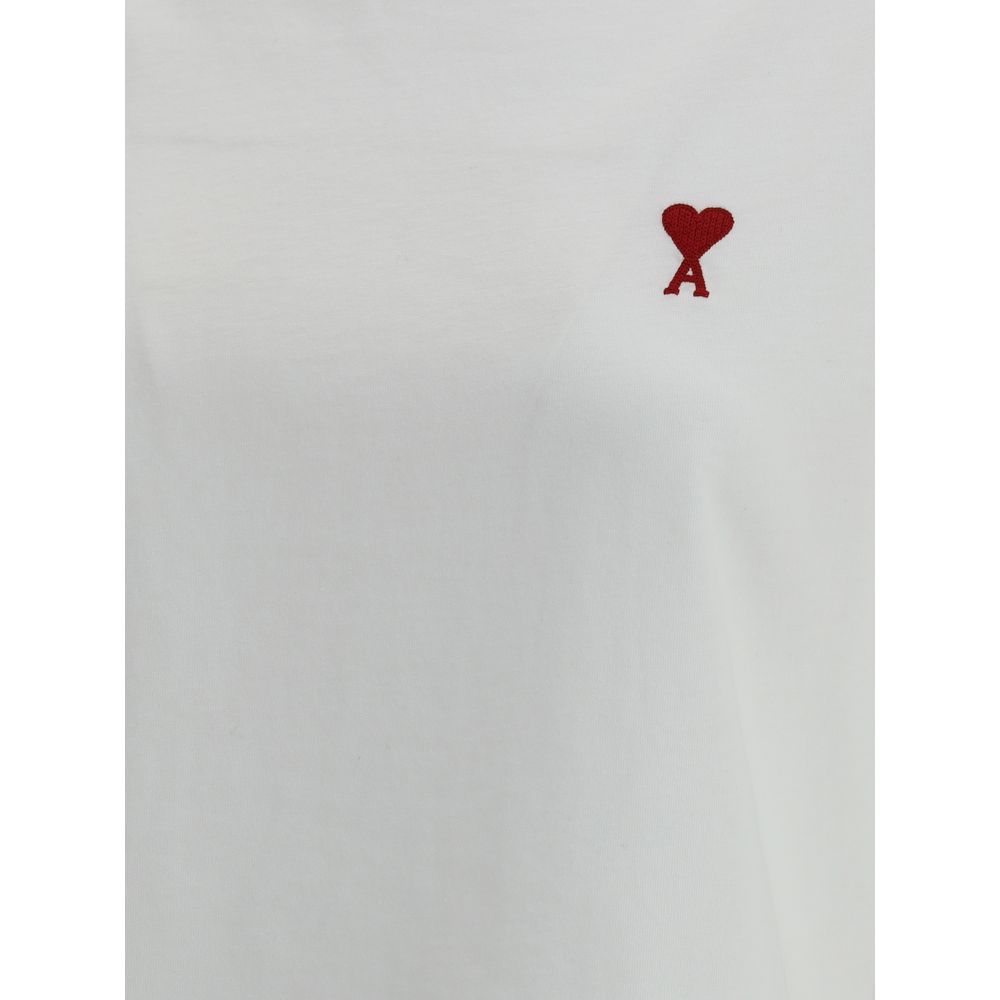 T-Shirt by Ami Paris for women in cotton white showcases a fashionable silhouette, elegantly detailed with a fashionable and for a sophisticated, high-fashion look.