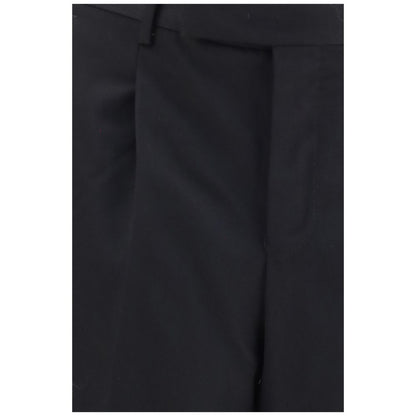 Casual Pants by PT Torino for men in wool black presents a refined pantology silhouette, artfully defined by a refined pantology straight-leg, relaxed-fit & regular-fit, long, and a sophisticated .