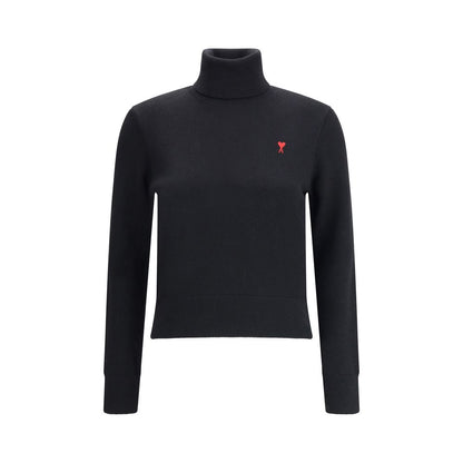 Sweater by Ami Paris for women in merino wool black showcases a sumptuous silhouette, artfully finished with a sumptuous turtle neckline and for a sophisticated, sumptuous look.