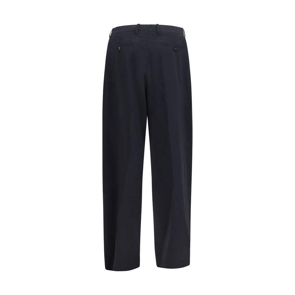 Trousers by Giorgio Armani for men in virgin wool blue features an sartorial silhouette, showcasing a precise relaxed-fit & oversized and long with a sartorial for a refined look.