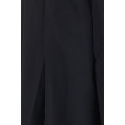 Trousers by Giorgio Armani for men in virgin wool blue features a sculptural silhouette, showcasing a sculptural relaxed-fit & oversized and long with a sophisticated for a sculptural finish.