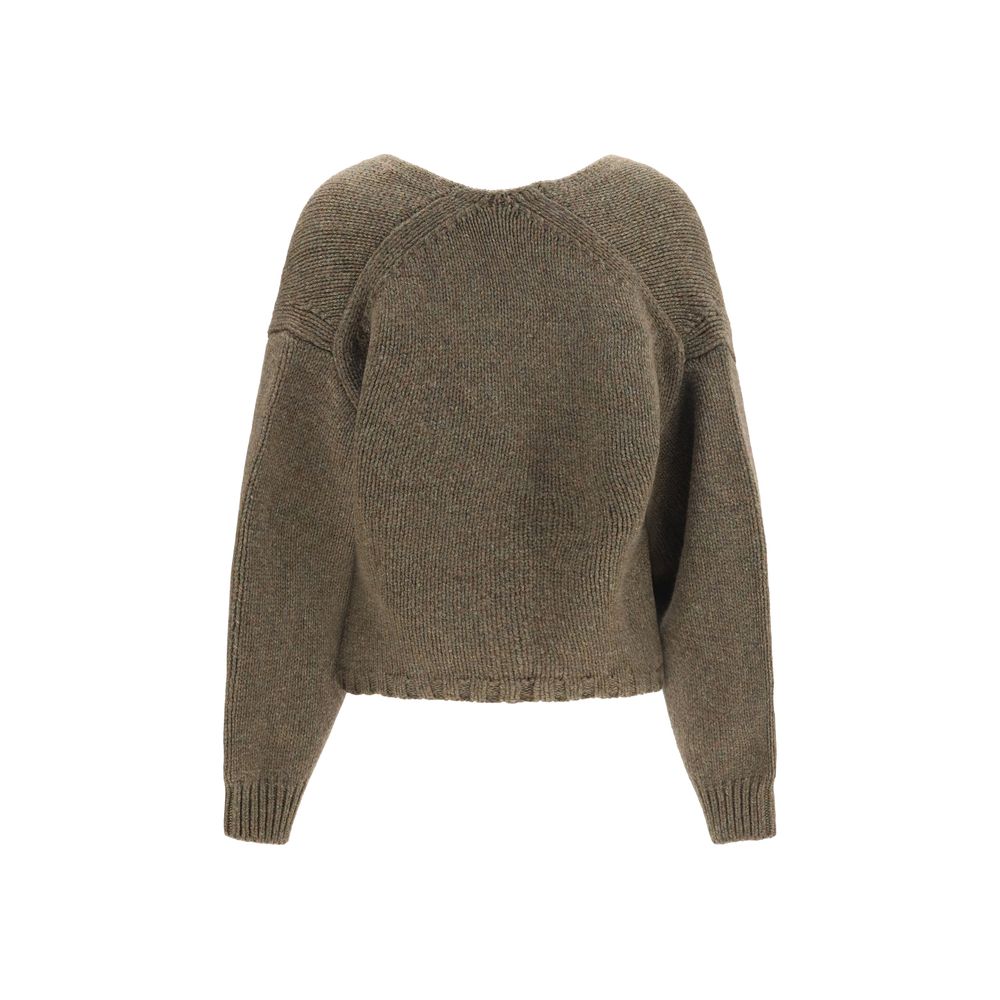 Cardigan by Khaite for women in cashmere & capra leather bicolour features an crisp silhouette, showcasing a sophisticated v-neck neckline and detail for a truly crisp finish.