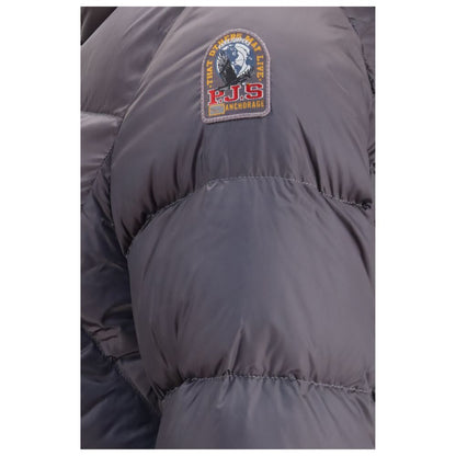 Hooded Puffer Jacket by Parajumpers for women in nylon polyester duck & goose down gray features a dramatic silhouette, showcasing a sophisticated hooded neckline and distinctive pockets, hooded & insulated for a dramatic aesthetic.