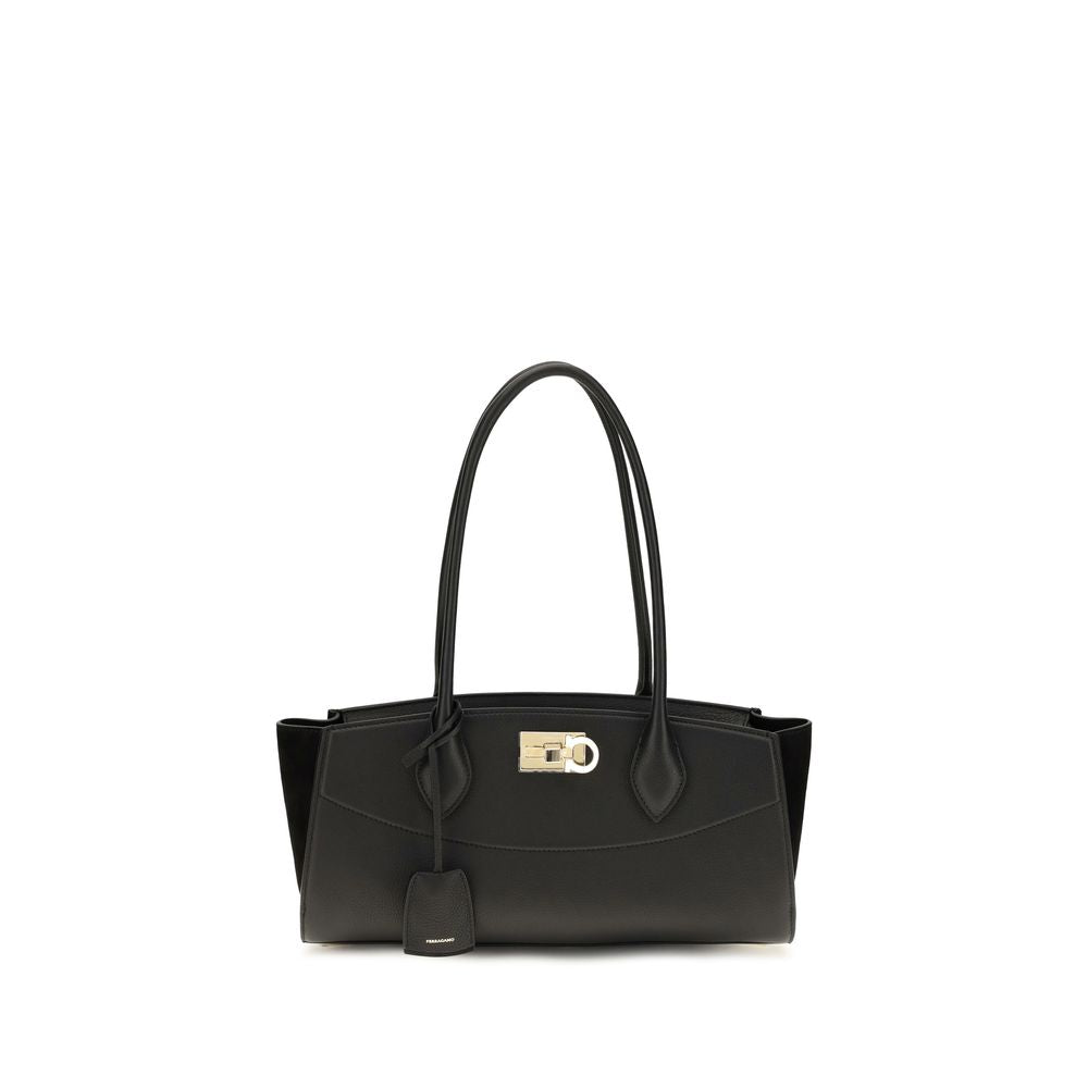 East West Shoulder Bag by Ferragamo for women in bos taurus suede calf leather black & signature showcases a enviable silhouette, artfully detailed with a secure buckle, organized external-pockets, and versatile shoulder-strap & handle for a enviable look.