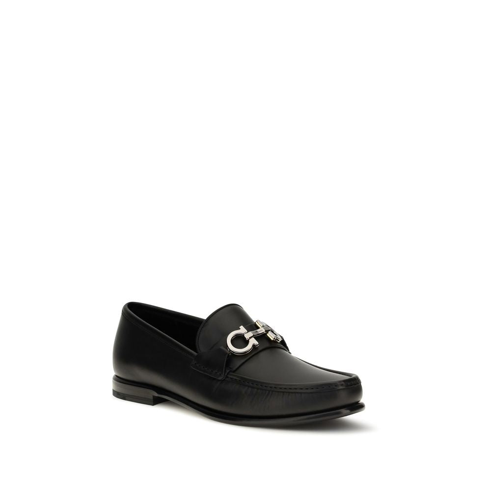 Loafer Slip-On Shoes by Ferragamo for men in bos taurus calf leather black & signature features an dynamic silhouette from the Gancini Men's Bos Taurus Calf Leather Loafer Slip-On Shoes collection, defined by a dynamic and for a dynamic look.