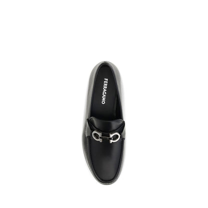 Loafer Slip-On Shoes by Ferragamo for men in bos taurus calf leather black & signature features an effortless chic silhouette, showcasing the Gancini Men's Bos Taurus Calf Leather Loafer Slip-On Shoes design with an effortless chic and a for a effortless chic look.