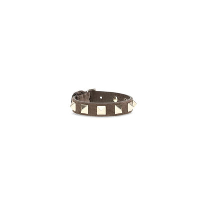 Bracelet by Valentino Garavani for women in bos taurus calf nappa & suede leather brown features a architectural silhouette, elegantly showcasing a architectural that defines the Rockstud Women's Bos Taurus Calf Leather Bracelet aesthetic.