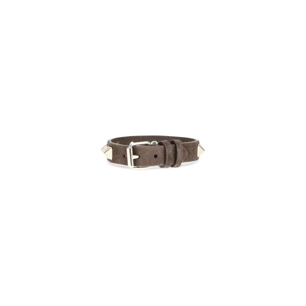 Bracelet by Valentino Garavani for women in bos taurus calf nappa & suede leather brown showcases a enchanting silhouette, artfully highlighting the and signature Rockstud Women's Bos Taurus Calf Leather Bracelet aesthetic in this enchanting piece.