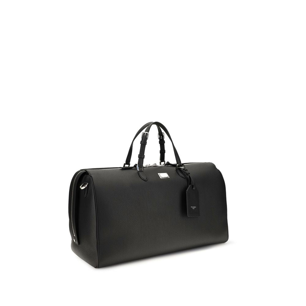 Briefcase by Dolce & Gabbana for men in pvc bos taurus calfskin nappa leather & palladium black, natural & palladium presents a contemporary silhouette from the Vittoria PVC Bos Taurus Calfskin Nappa Leather & Palladium Briefcase collection, featuring a contemporary zipper, ample internal-pockets, and versatile shoulder-strap, handle & adjustable-strap.