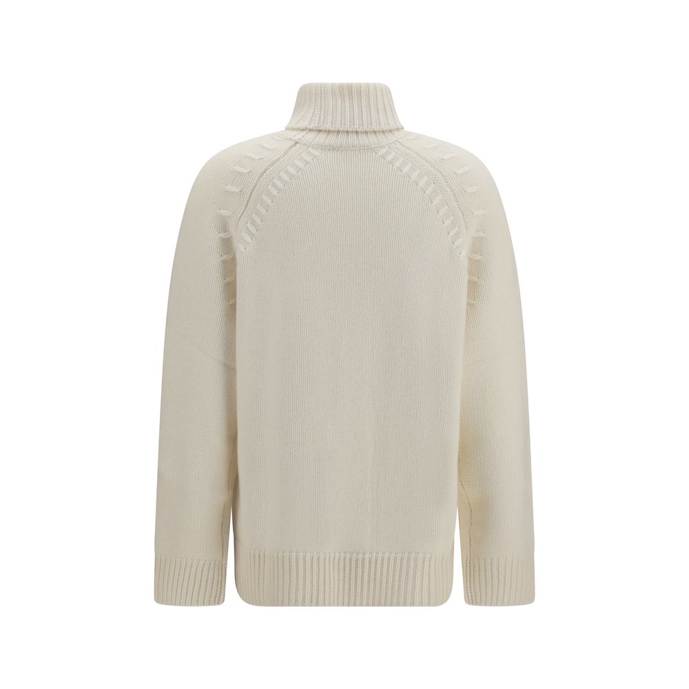 This Sweater by P.A.R.O.S.H. for women in cashmere & capra leather beige presents a understated silhouette, featuring a sophisticated turtle high-neck neckline and for a understated finish.