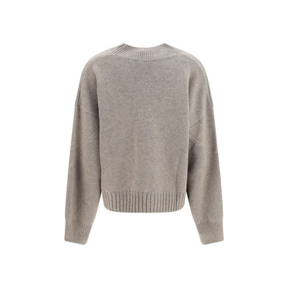 Sweater by Malo for women in cashmere & capra leather beige features an tactile silhouette, showcasing a sophisticated crew neckline and tactile for a refined finish.