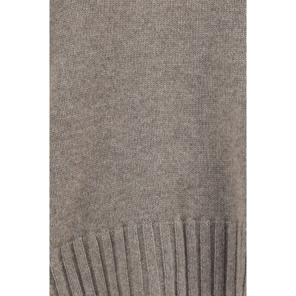 This Sweater by Malo for women in cashmere & capra leather beige presents a understated silhouette, featuring a sophisticated and for a understated finish.