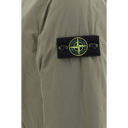 Hooded Windbreaker Jacket by Stone Island for men in polyamide polyester twill bicolour & signature showcases a urban chic silhouette, detailed with a urban chic and functional pockets, hooded, insulated & windproof for a polished finish.