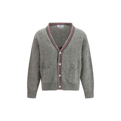 Cardigan by Thom Browne for men in merino wool & mohair gray, signature, patchwork & striped features an impeccable silhouette, showcasing a sophisticated v-neck neckline and detail for a truly impeccable finish.