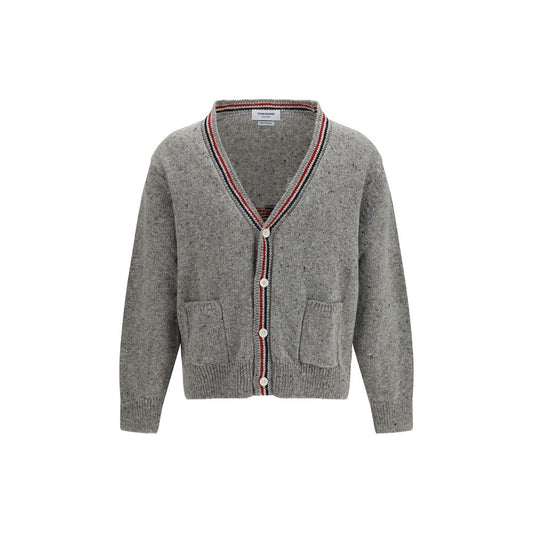 Cardigan by Thom Browne for men in merino wool & mohair gray, signature, patchwork & striped features an impeccable silhouette, showcasing a sophisticated v-neck neckline and detail for a truly impeccable finish.