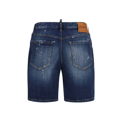 Denim Shorts by Dsquared² for men in distressed cotton denim blue presents a contemporary silhouette, featuring a contemporary slim and short with a contemporary for a sophisticated summer look.