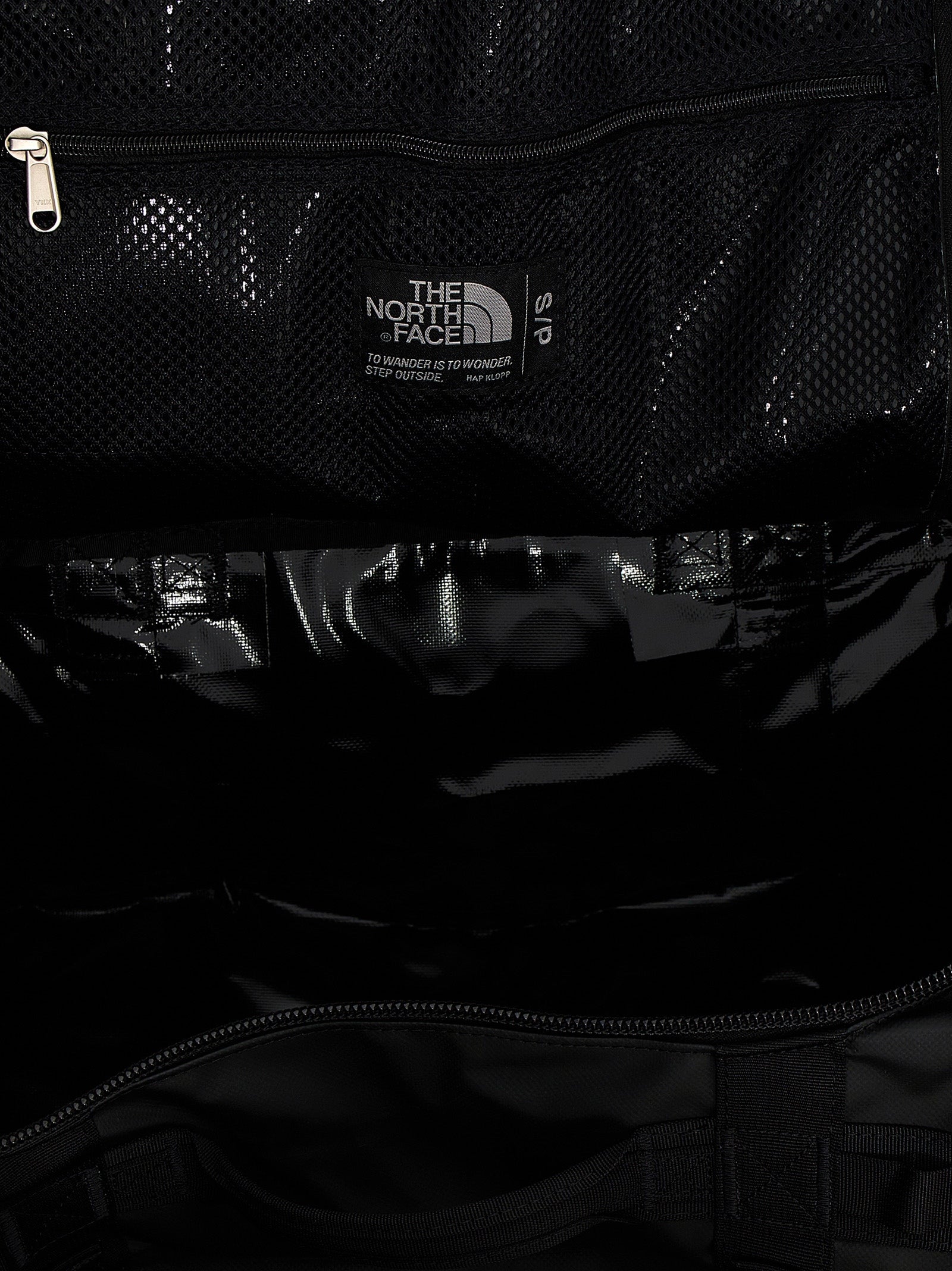 Small Travel Flap Backpack by The North Face for unisex in lyocell polyester mesh black features an ultra-portable silhouette from the Base Camp Duffel City Lyocell Polyester Mesh Small Travel Flap Backpack range, with a secure flap & zipper, ample , and versatile backpack-strap, adjustable-strap & handle.