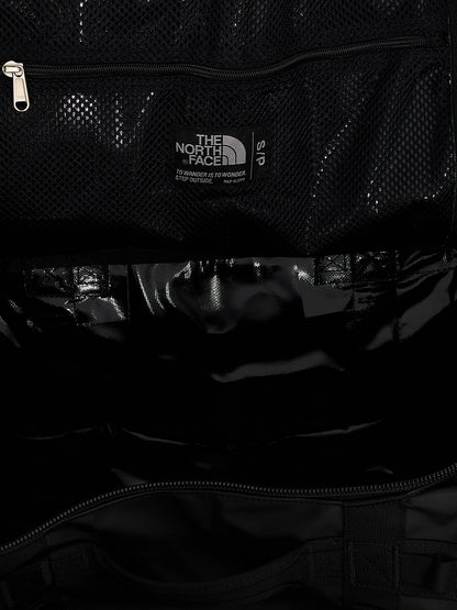 Small Travel Flap Backpack by The North Face for unisex in lyocell polyester mesh black features an ultra-portable silhouette from the Base Camp Duffel City Lyocell Polyester Mesh Small Travel Flap Backpack range, with a secure flap & zipper, ample , and versatile backpack-strap, adjustable-strap & handle.