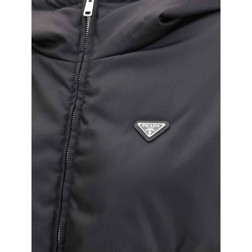 Hooded Windbreaker Jacket by Prada for women in nylon black features an perennial silhouette with a refined and perennial pockets, hooded & windproof for a sophisticated weather-resistant look.