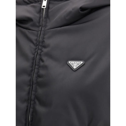 Hooded Windbreaker Jacket by Prada for women in nylon black features an perennial silhouette with a refined and perennial pockets, hooded & windproof for a sophisticated weather-resistant look.