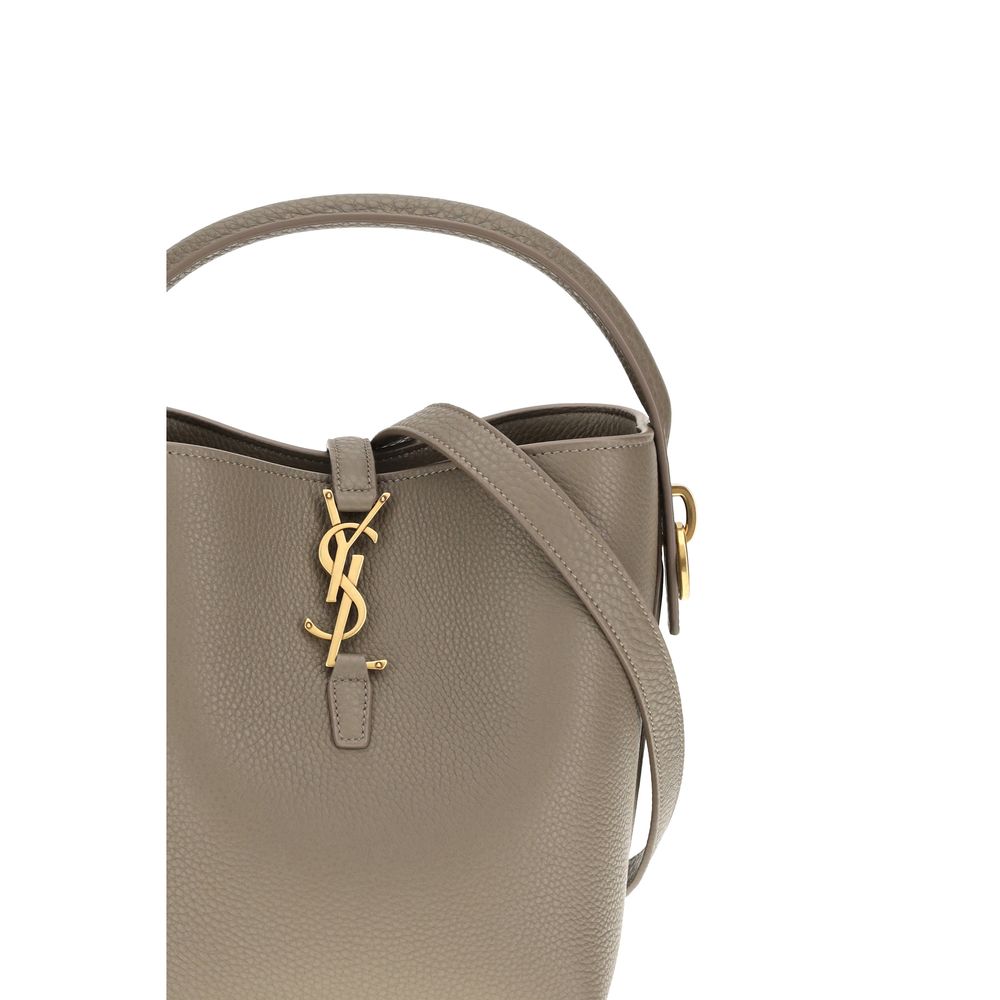 Mini Bucket Handbag by Saint Laurent for women in bos taurus calf grained & suede leather beige & signature features an sun-drenched silhouette, showcasing a secure hook, ample , and versatile shoulder-strap, handle & adjustable-strap for a truly sun-drenched finish.