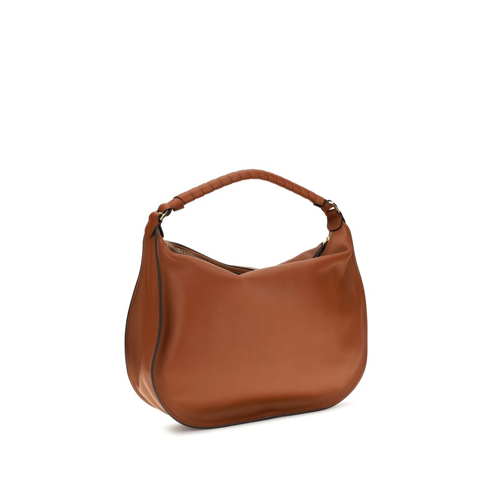 Large Shoulder Flap Bag by Chloé for women in bos taurus calfskin leather brown features an effortlessly chic silhouette with a secure flap & zipper, ample external-pockets, and versatile shoulder-strap for effortlessly chic everyday luxury.