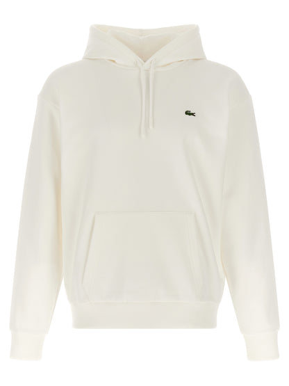Sweatshirt Hoodie by Lacoste for men in poly cotton & crocodile skin leather cream & white showcases a city-ready silhouette, artfully detailed with a signature hooded neckline and for a city-ready finish.