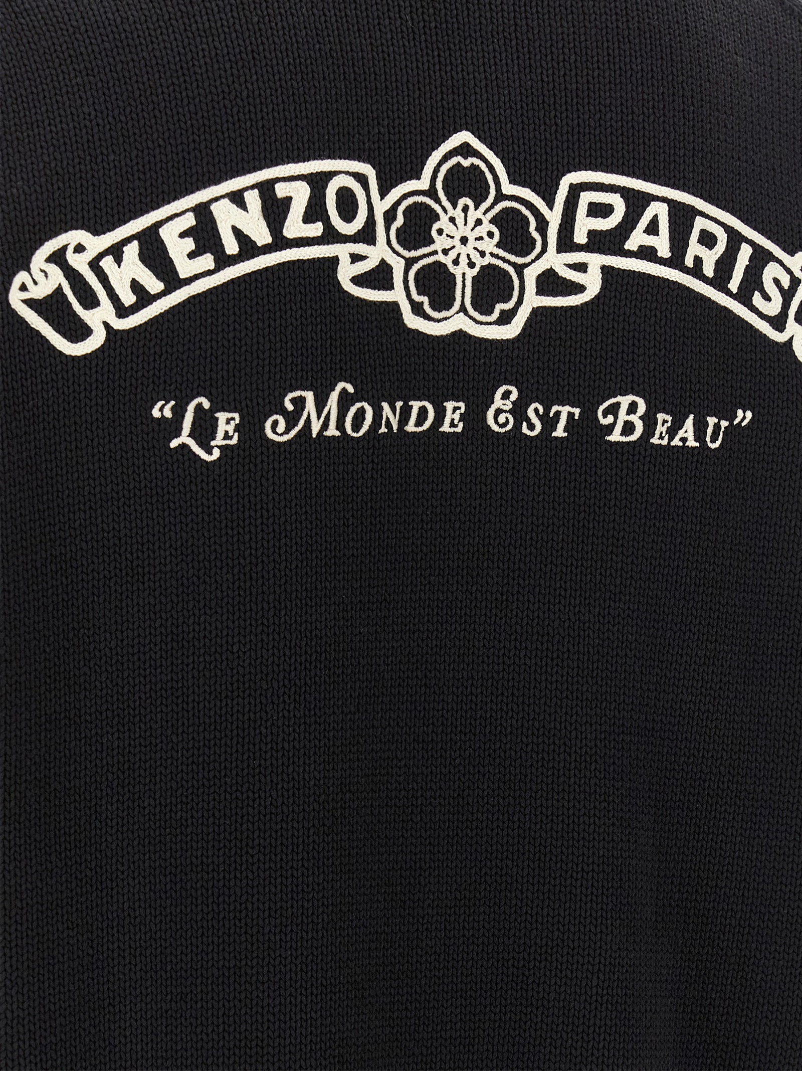 Cardigan by Kenzo for men in cotton bicolour, black, cream, silver, white & striped features a nuanced silhouette with a refined and nuanced detailing for a sophisticated look.