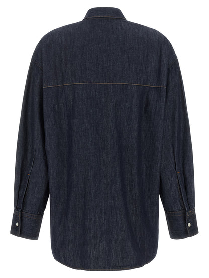 Blouse by Khaite for women in denim cotton blue & indigo showcases a sleek silhouette, elegantly detailed with a sleek and for a sleek finish.