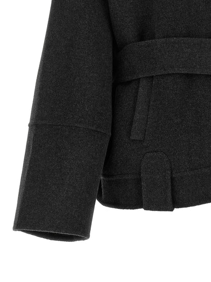 Overcoat by Khaite for women in wool gray features a contemporary silhouette showcasing a contemporary and refined for a sophisticated finish.