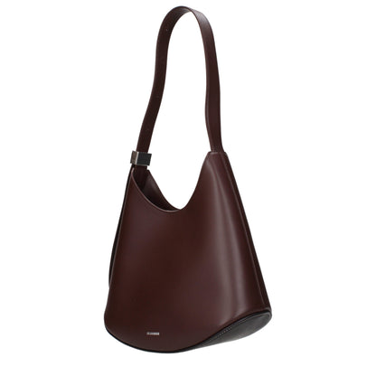Shoulder Bag by Jil Sander for women in leather red features a statuesque silhouette, showcasing a secure and statuesque with versatile shoulder-strap, adjustable-strap & handle for a statuesque finish.