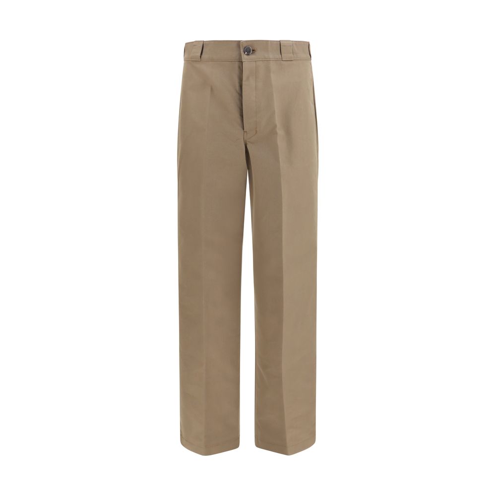 Casual Pants by Prada for men in polyamide cotton canvas brown & signature presents a tailored silhouette, showcasing a tailored regular-fit, wide & oversized and long cut with a refined for a truly tailored aesthetic.