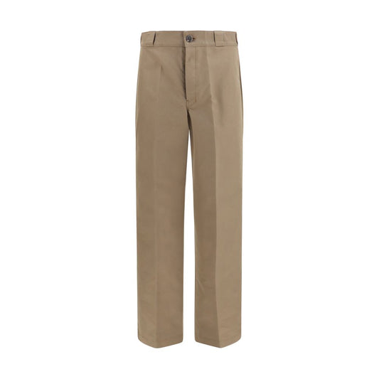 Casual Pants by Prada for men in polyamide cotton canvas brown & signature presents a tailored silhouette, showcasing a tailored regular-fit, wide & oversized and long cut with a refined for a truly tailored aesthetic.