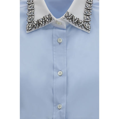 Dress Shirt by Prada for women in cotton blue showcases a sublime silhouette, artfully detailed with a sublime and for a sophisticated, sublime finish.
