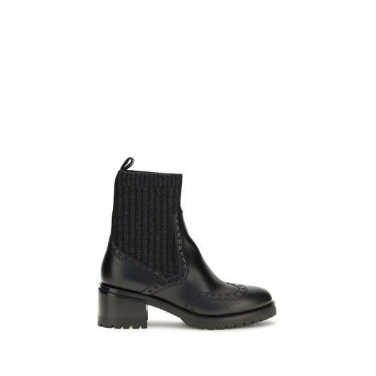 Ankle Cut-Out Boots by Santoni for women in bos taurus calfskin leather black features an high-performance silhouette, showcasing the sophisticated design of the Women's Bos Taurus Calfskin Leather Ankle Cut-Out Boots with a and a refined .