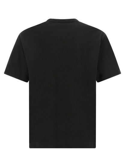 T-Shirt by Kenzo for men in cotton black, blue & yellow showcases a dramatic silhouette, elegantly detailed with a dramatic crew neckline and for a truly dramatic finish.