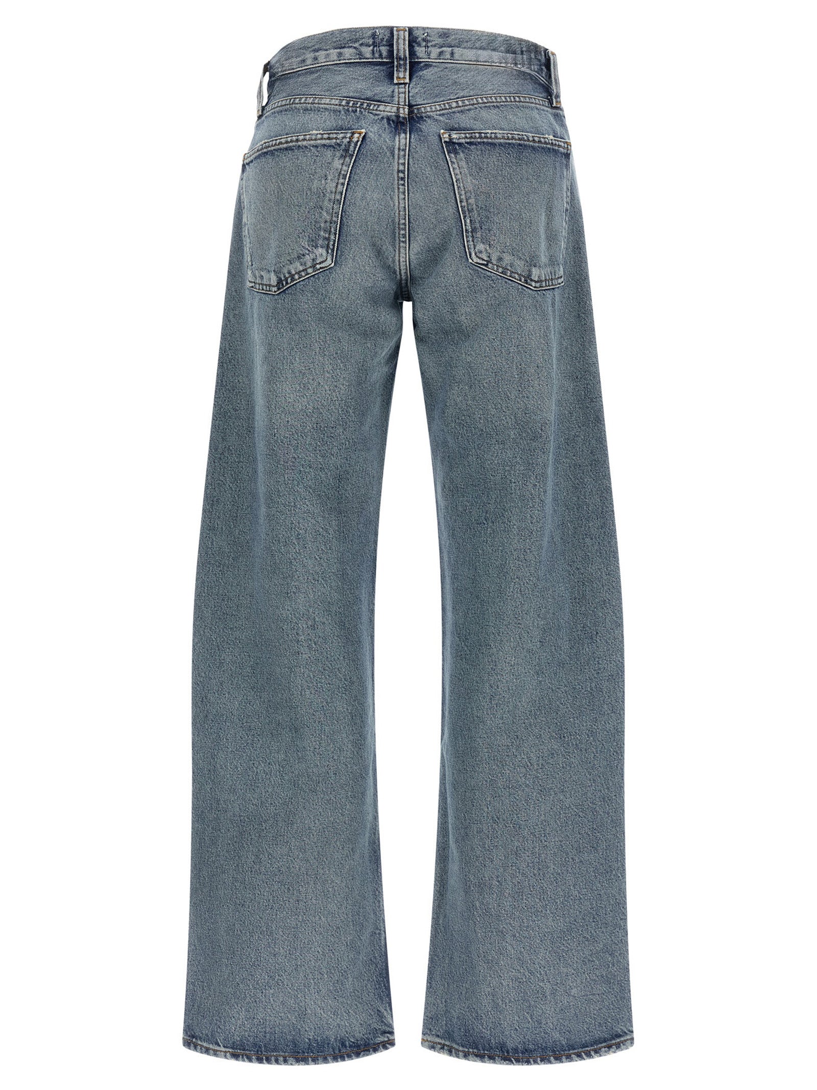 Jeans by Agolde for women in lyocell & denim cotton blue & indigo features a polished silhouette with a polished relaxed-fit & wide, reaching a polished long and finished with a polished .