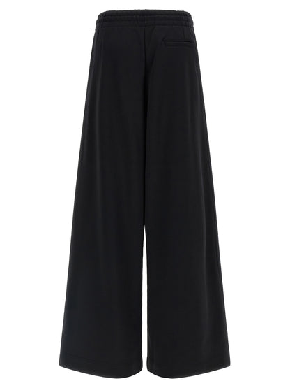 Activewear Pants by Dries Van Noten for women in cotton black & silver features a ergonomic athletic & flared and with a ergonomic long, showcasing innovative for a ergonomic look.