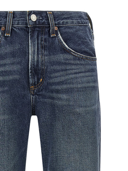 Jeans by Agolde for women in denim cotton blue & indigo features an refined tailoring silhouette, showcasing a premium flared & bootcut with a mid rise and long cut for a refined tailoring look.
