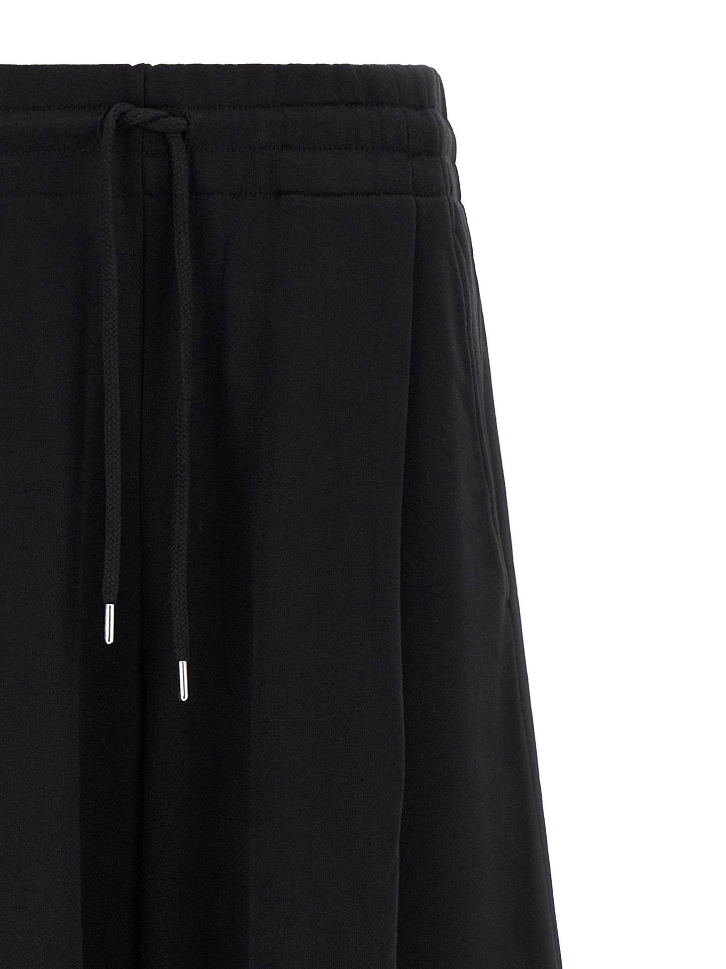 Activewear Pants by Dries Van Noten for women in cotton black & silver features an streamlined design with , highlighting a streamlined athletic & flared and long cut with a comfortable .