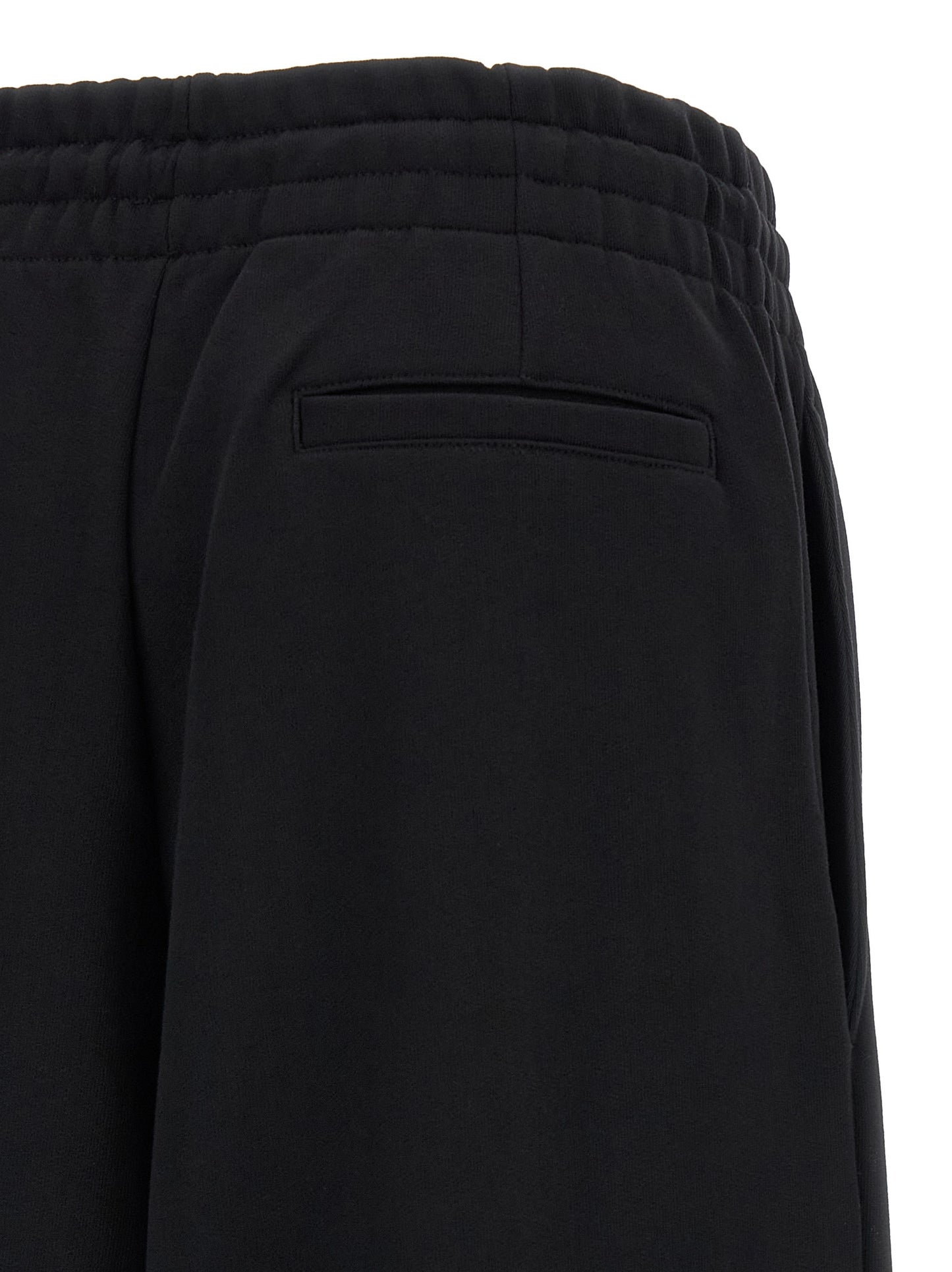 Activewear Pants by Dries Van Noten for women in cotton black & silver features an sporty athletic & flared with a long and , expertly finished with for an sporty performance aesthetic.