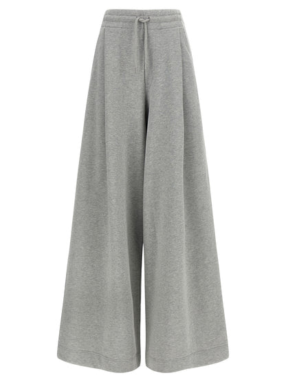 Casual Pants by Dries Van Noten for women in cotton gray & silver presents a refined pantology silhouette, artfully defined by a refined pantology wide, long, and a sophisticated mid rise.