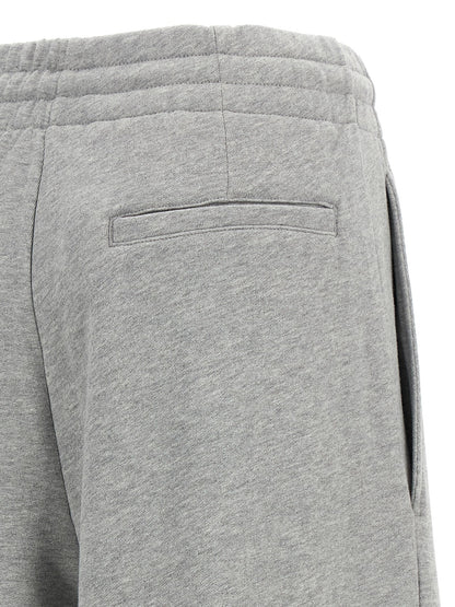 Casual Pants by Dries Van Noten for women in cotton gray & silver features a polished silhouette with a polished wide, reaching a polished long and finished with a polished mid rise.