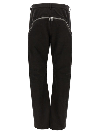 Trousers by Rick Owens for men in cotton black & silver features an sartorial silhouette, showcasing a precise flared and long with a sartorial for a refined look.