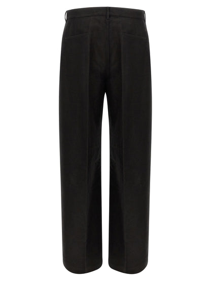 Trousers by Rick Owens for men in ramie & cotton black features a artisanal silhouette, showcasing a sophisticated wide with a long and for a artisanal finish.