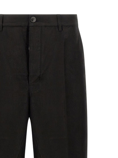 Trousers by Rick Owens for men in ramie & cotton black features a tailored silhouette with a tailored wide, defined by its long and a sophisticated .