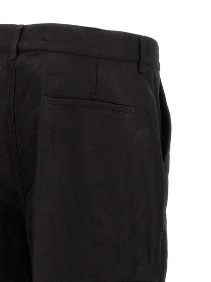 Trousers by Rick Owens for men in ramie & cotton black presents a smart silhouette, meticulously detailed with a smart wide, a smart long, and a smart .